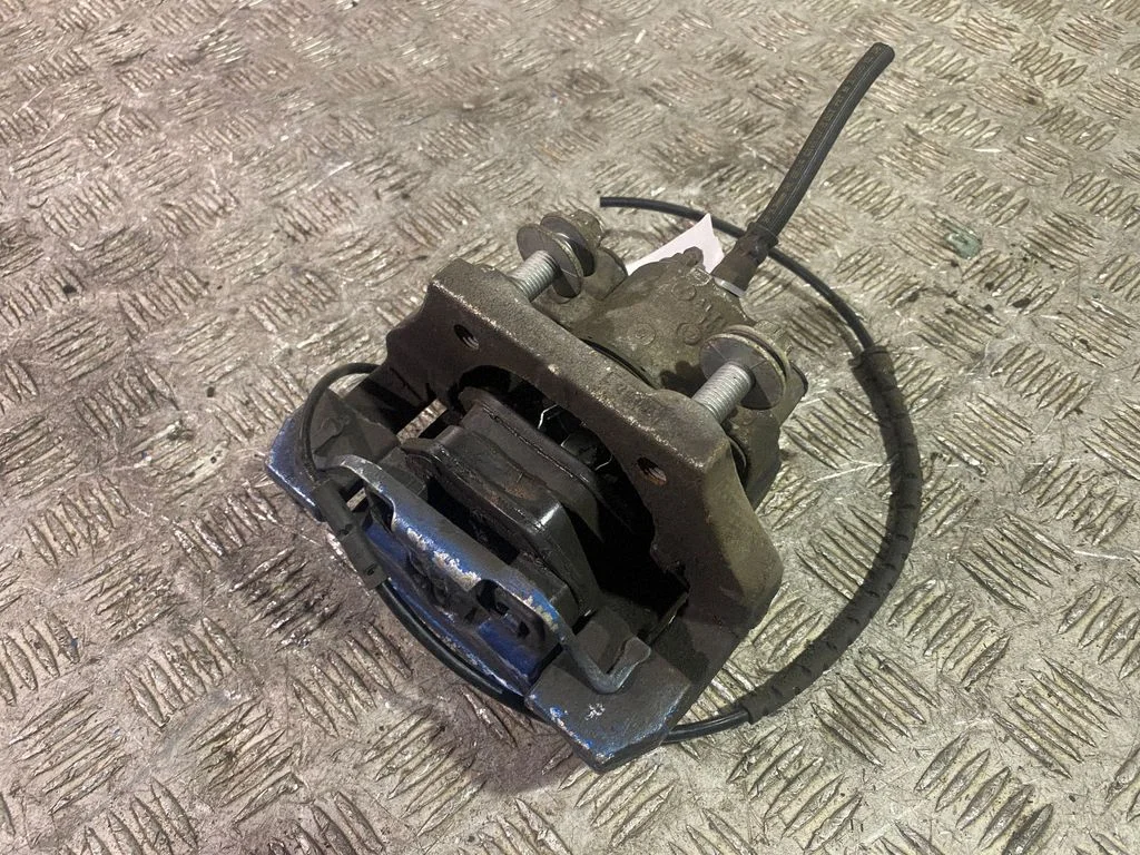 Rear brake caliper – right
