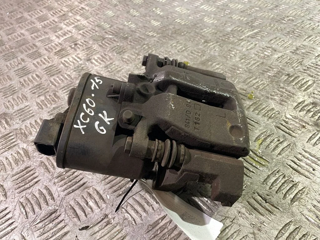 Rear brake caliper – left