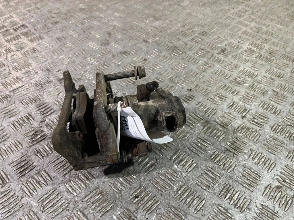 Rear brake caliper – right
