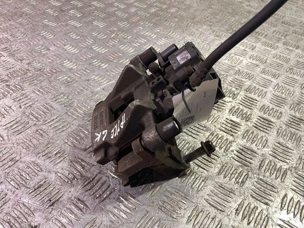 Rear brake caliper J9D32K328AB