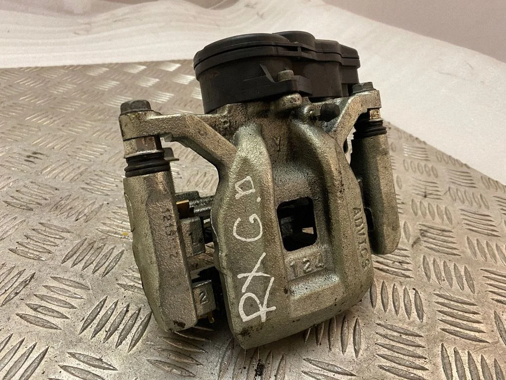 Rear brake caliper – right