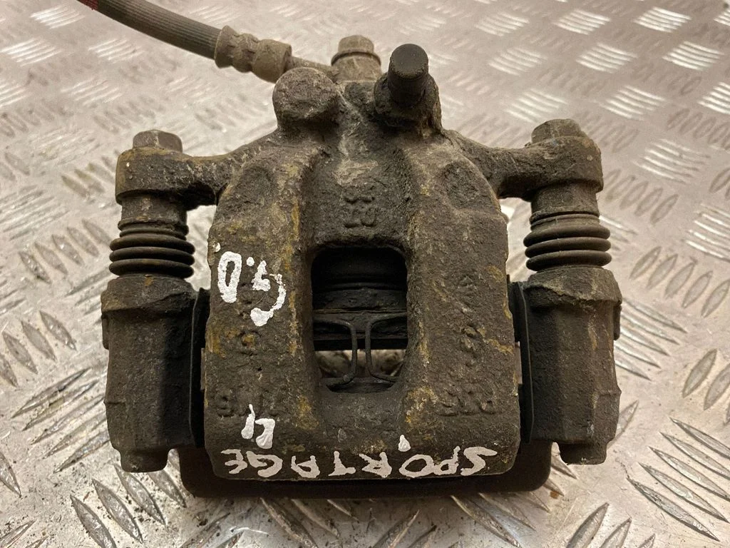 Rear brake caliper – right