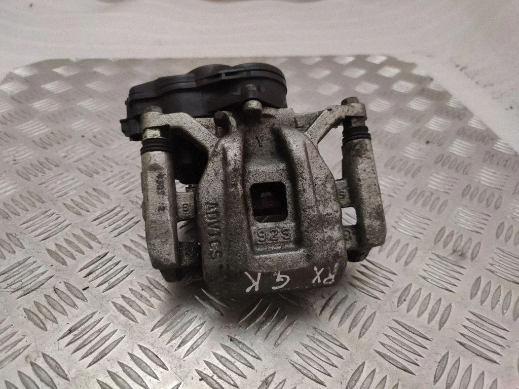 Rear brake caliper – left