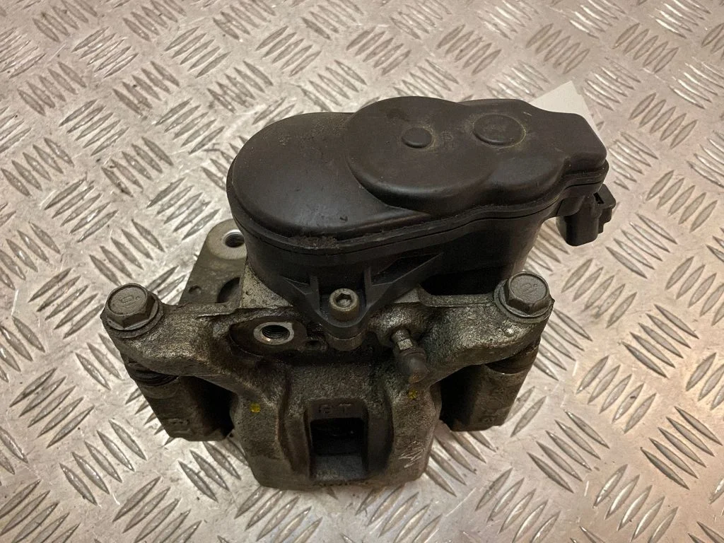 Rear brake caliper – right