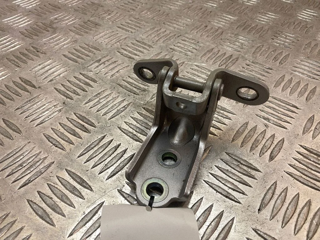 Rear door upper hinge – right