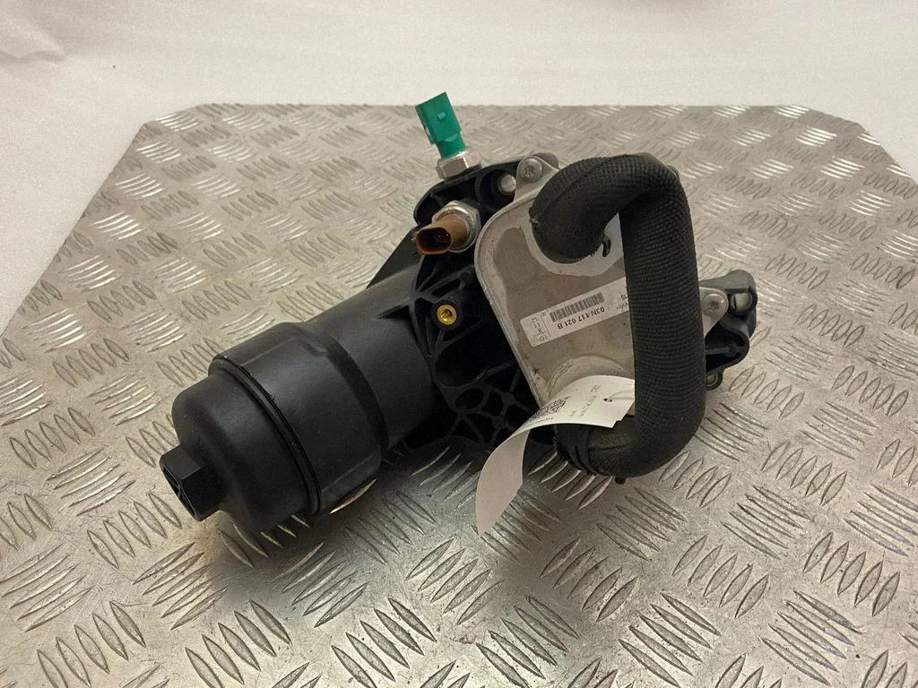 Oil filter mounting bracket 03N117021B
