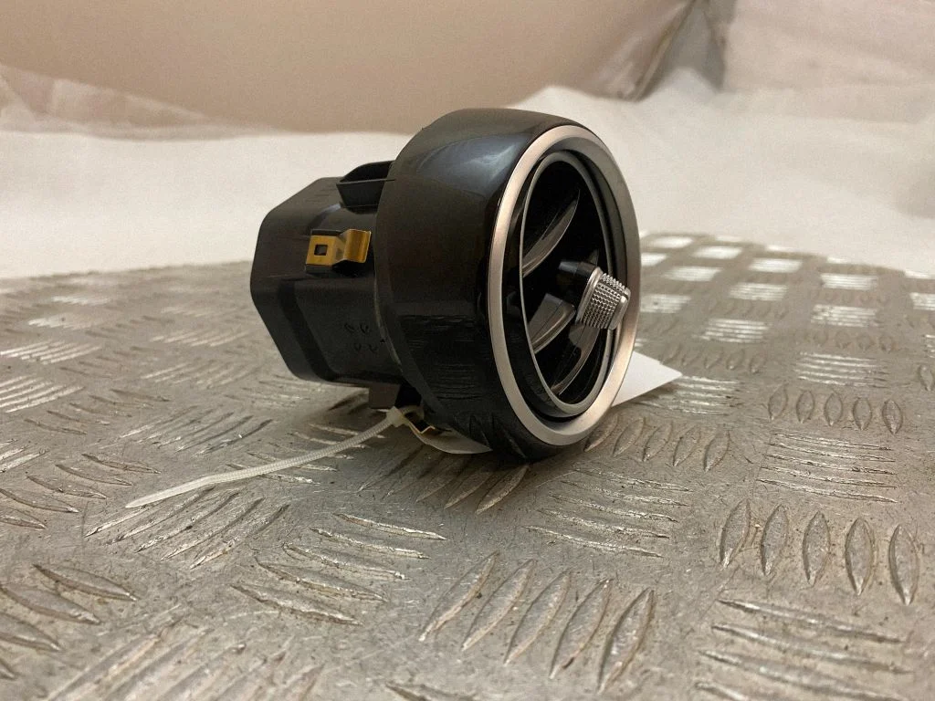Dash center air vent grill