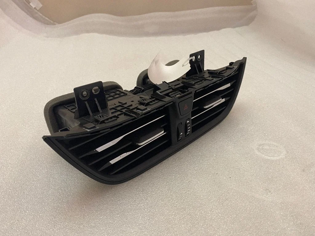 Dash center air vent grill JX7B19K617AP