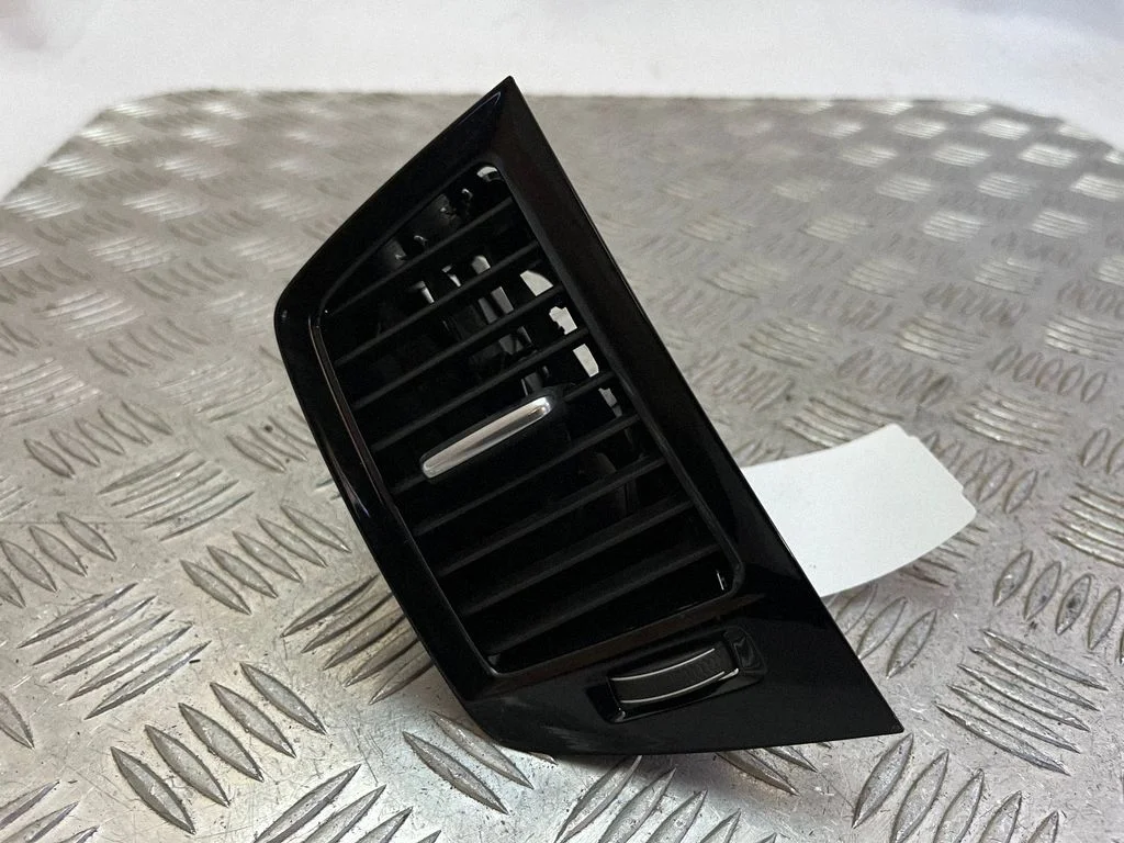 Dash center air vent grill 31651282