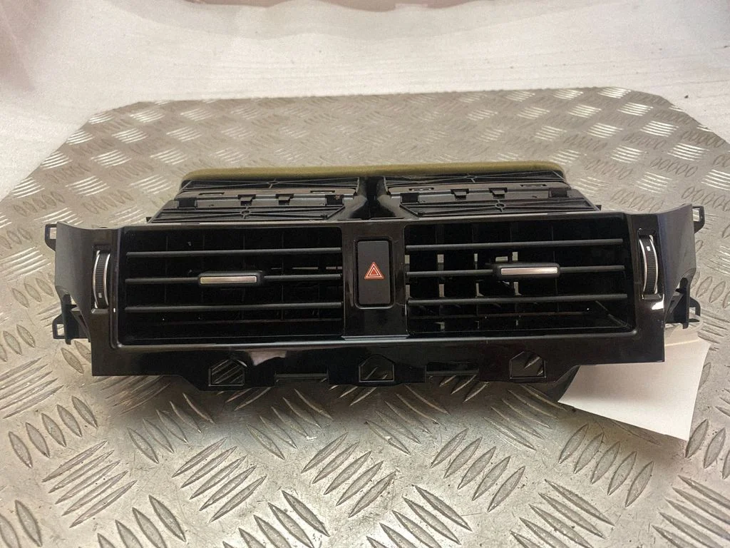 Dash center air vent grill 09846002