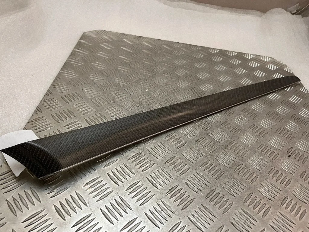 Front door trim bar K044AMCR4B45V