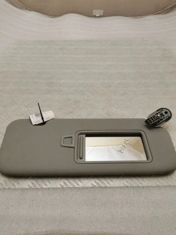 Sun visor – left