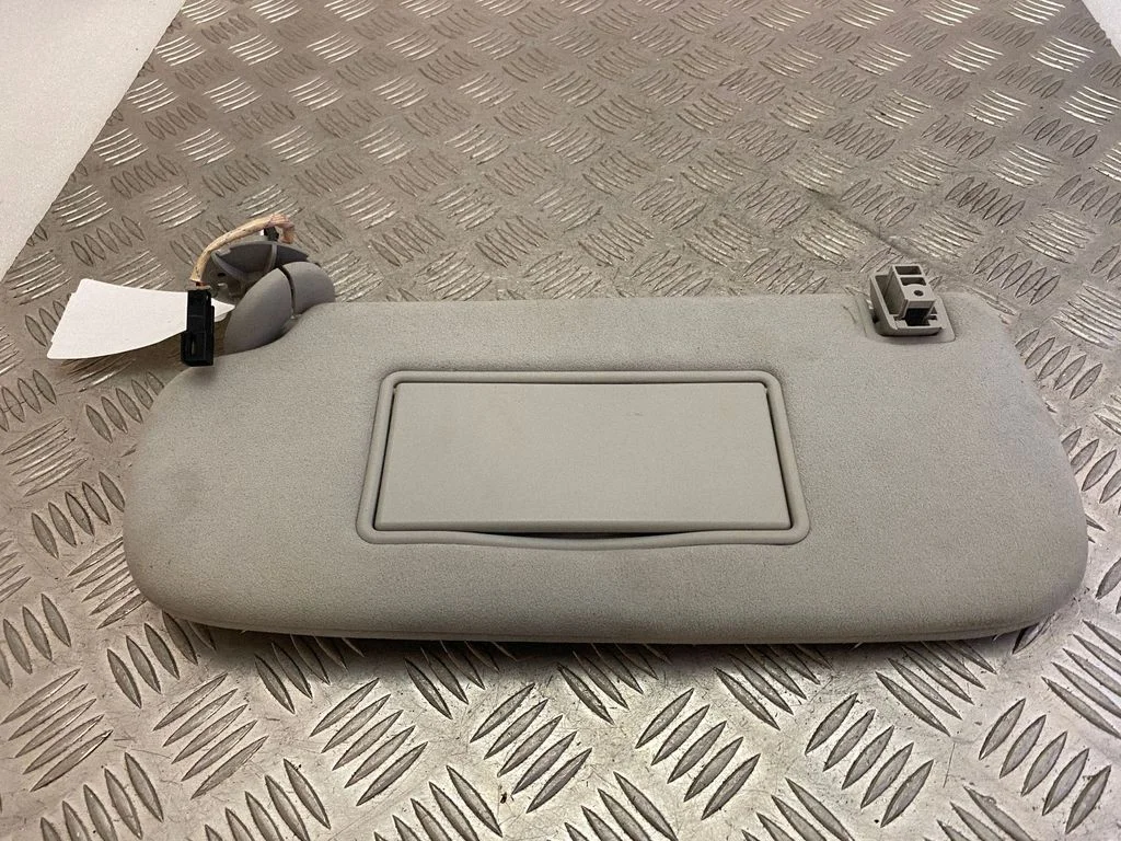 Sun visor – left