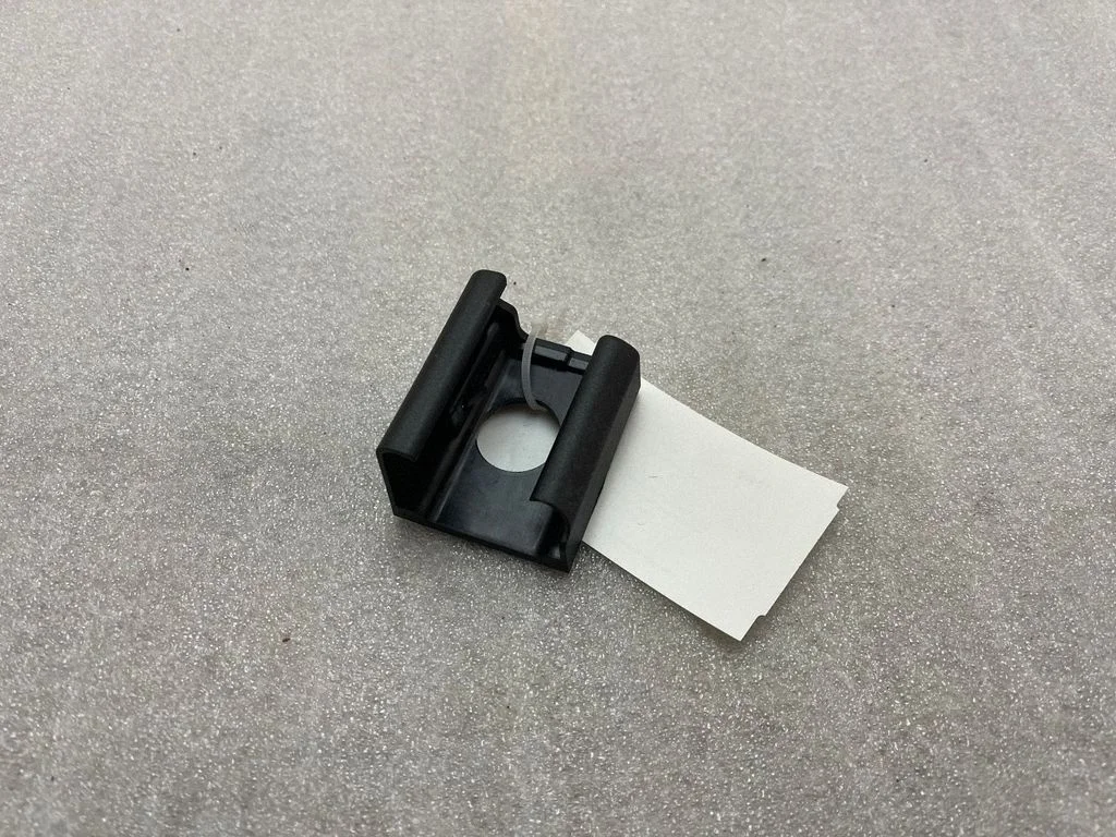 Front driver seat rail trim 7415073