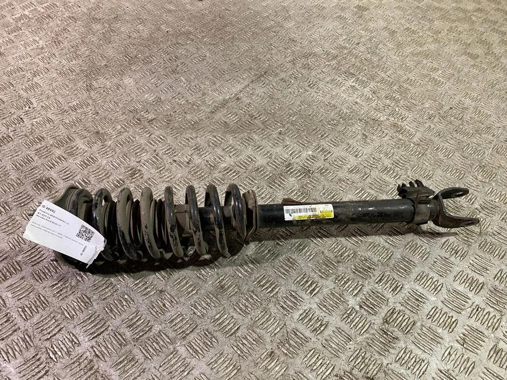 Front shock absorber with coil spring A2383204200
