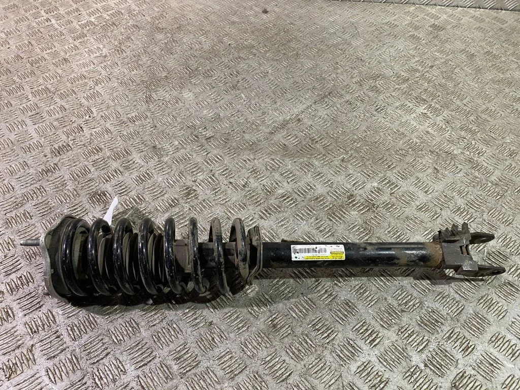 Front shock absorber with coil spring A2383204200