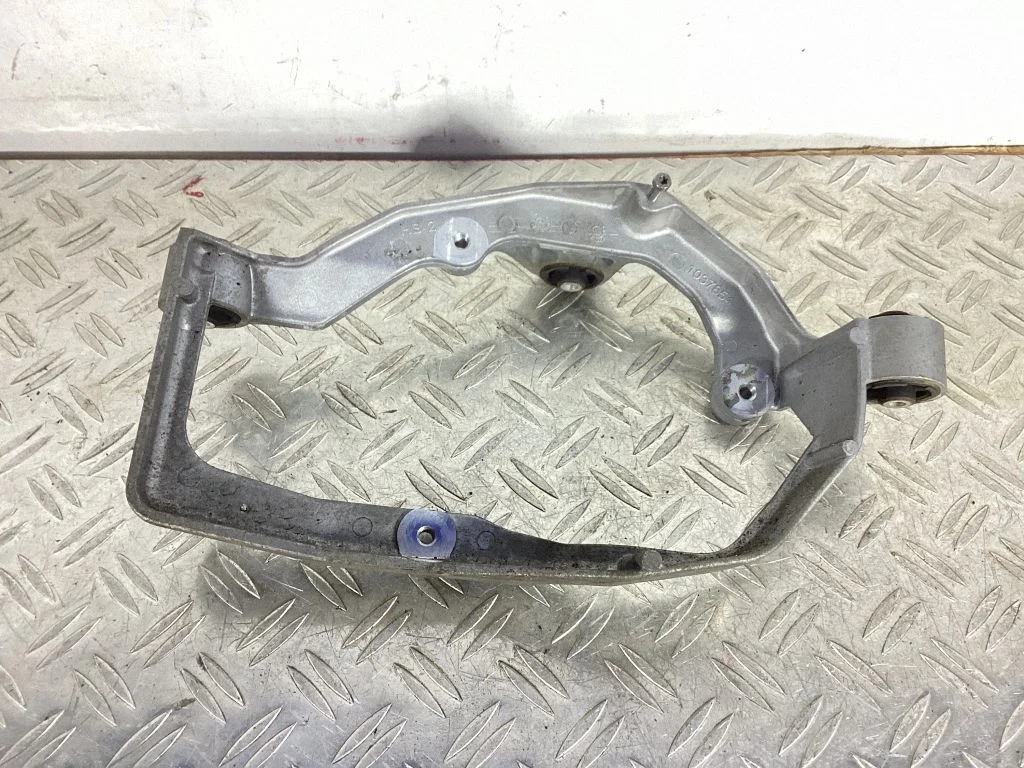 A/C compressor mount bracket – Tesla Model S (2012-)