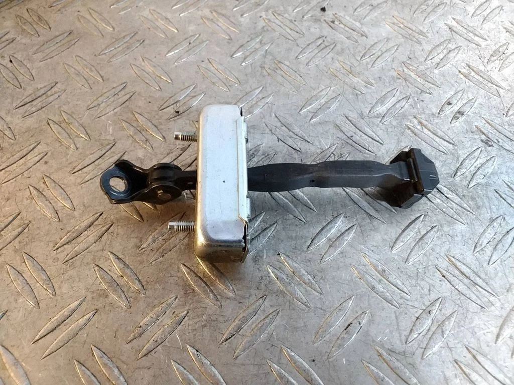 Rear door check strap stopper – Toyota Land Cruiser (J150) (2009-)