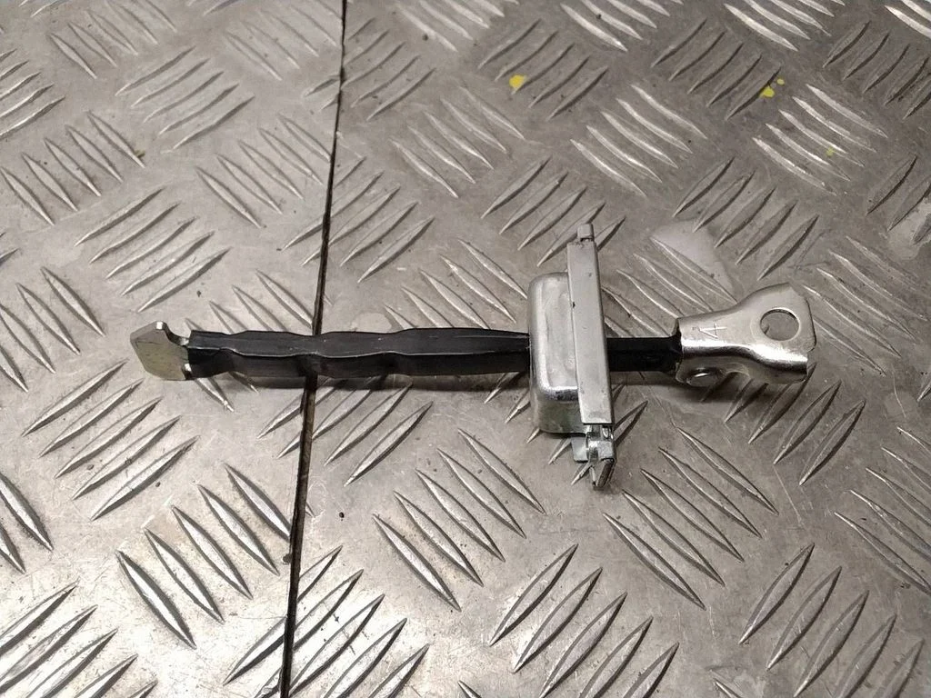 Rear door check strap stopper – Toyota RAV 4 (XA50) (2018-)