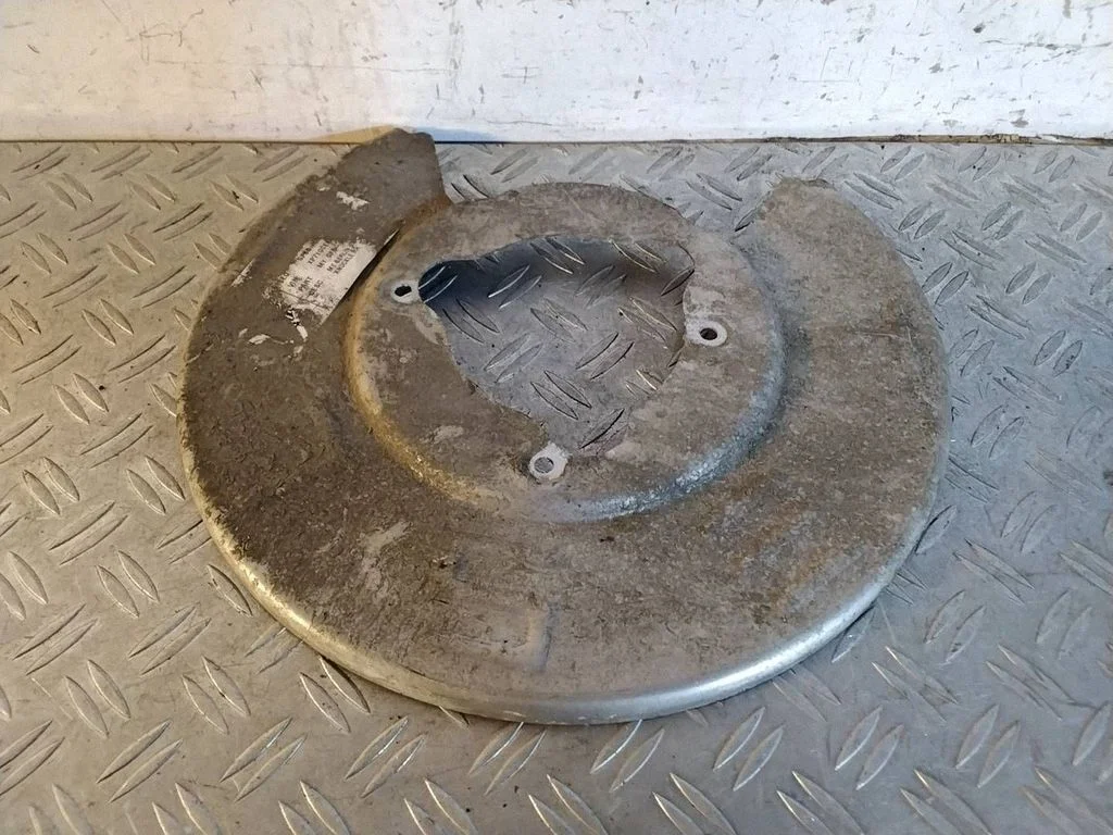 Rear brake disc plate dust cover – Tesla Model Y (2020-)