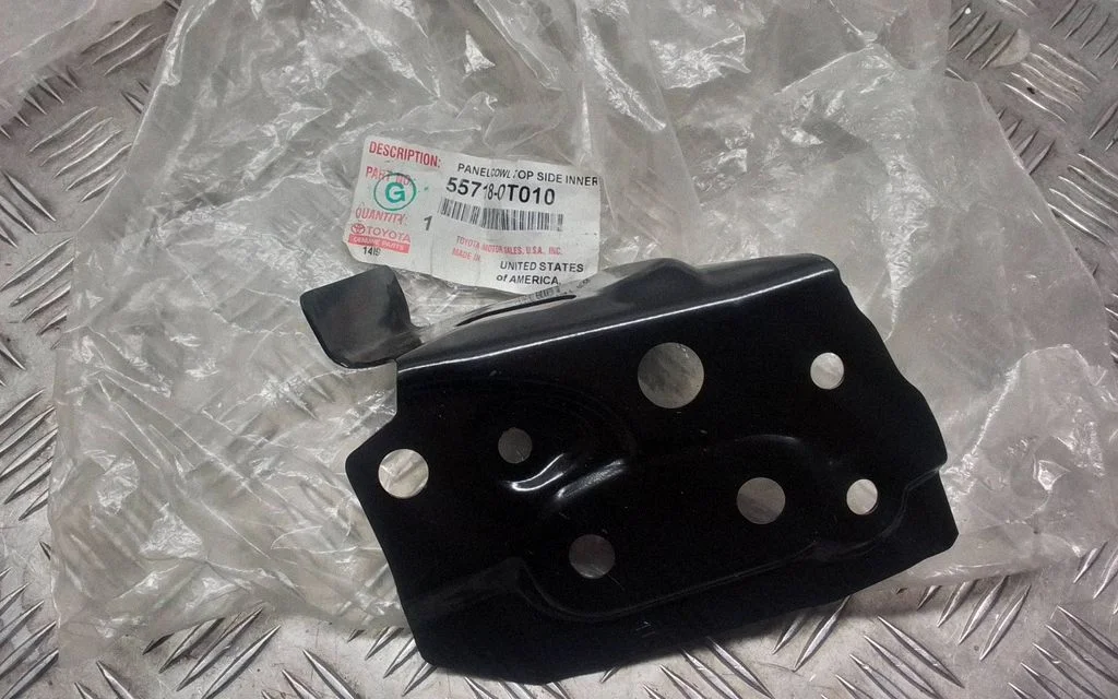 Radiator support slam panel bracket