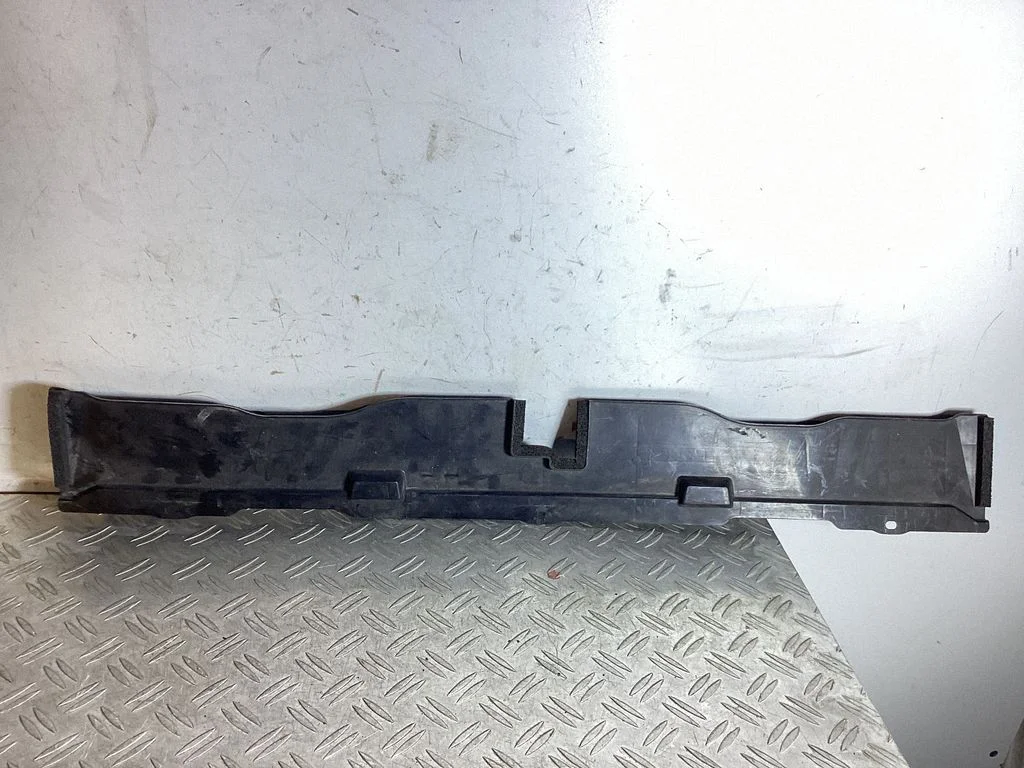 Bottom radiator support slam panel
