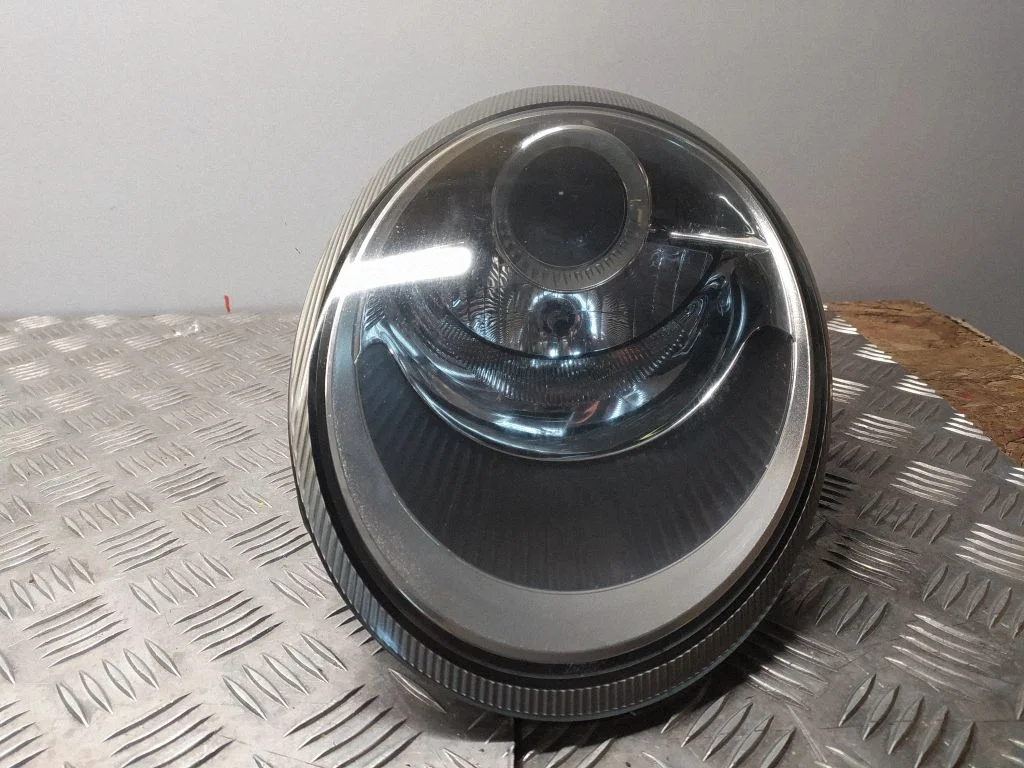 Reflektor – lewy przód