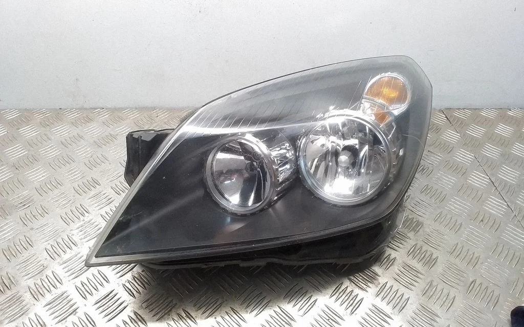 Reflektor 24451032 – Opel Astra H (2004-2012)