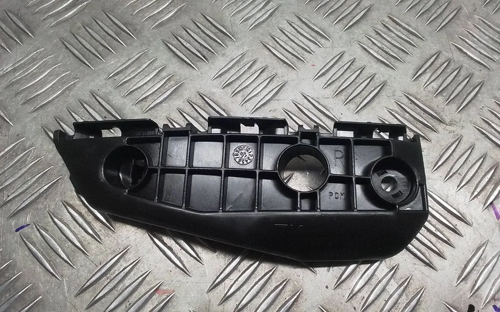 Front bumper mounting bracket 525350040