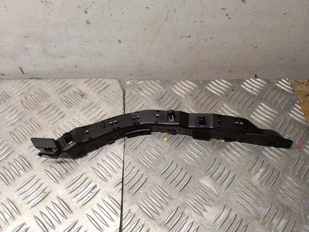 Front bumper mounting bracket 57707SA230