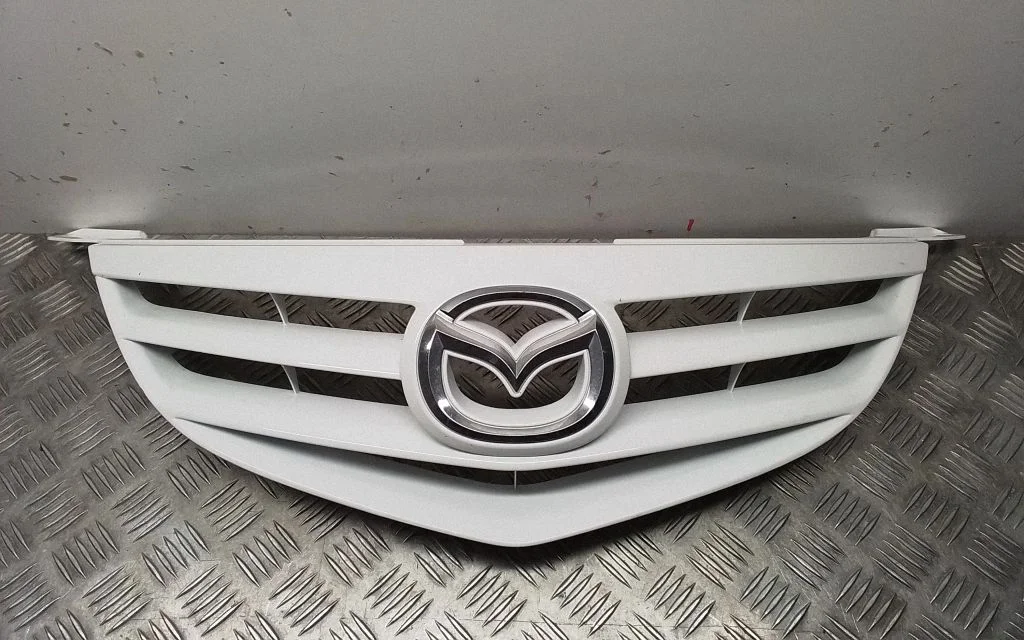 Esistange ülemine radiaatorivõre – Mazda 3 I (2003-2006)