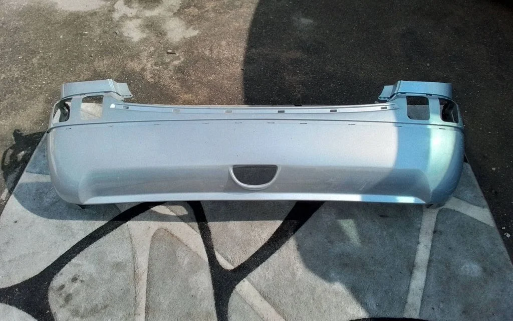 Rear bumper 866111G500