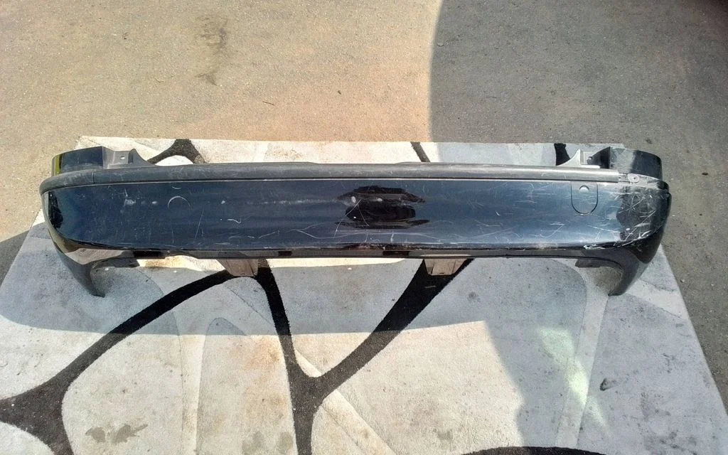 Rear bumper 90580820