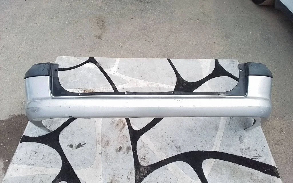 Rear bumper 90464566