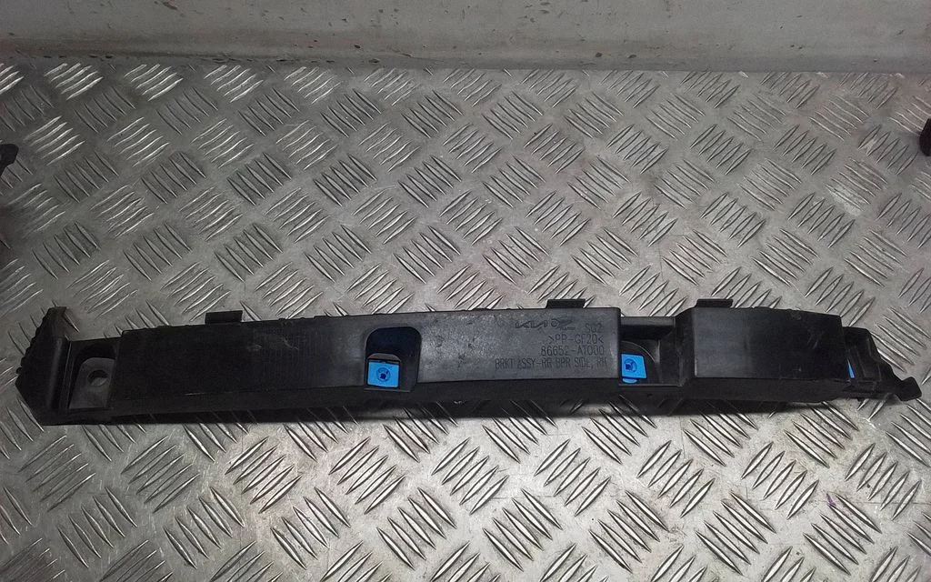 Rear bumper mounting bracket 86652AT000