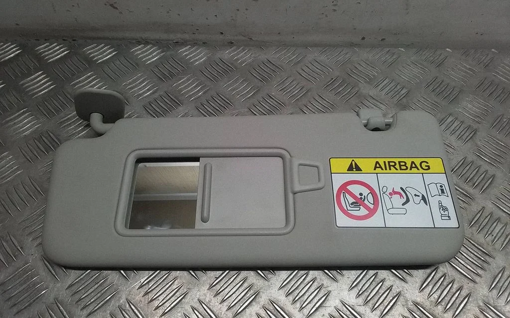 Sun visor – left