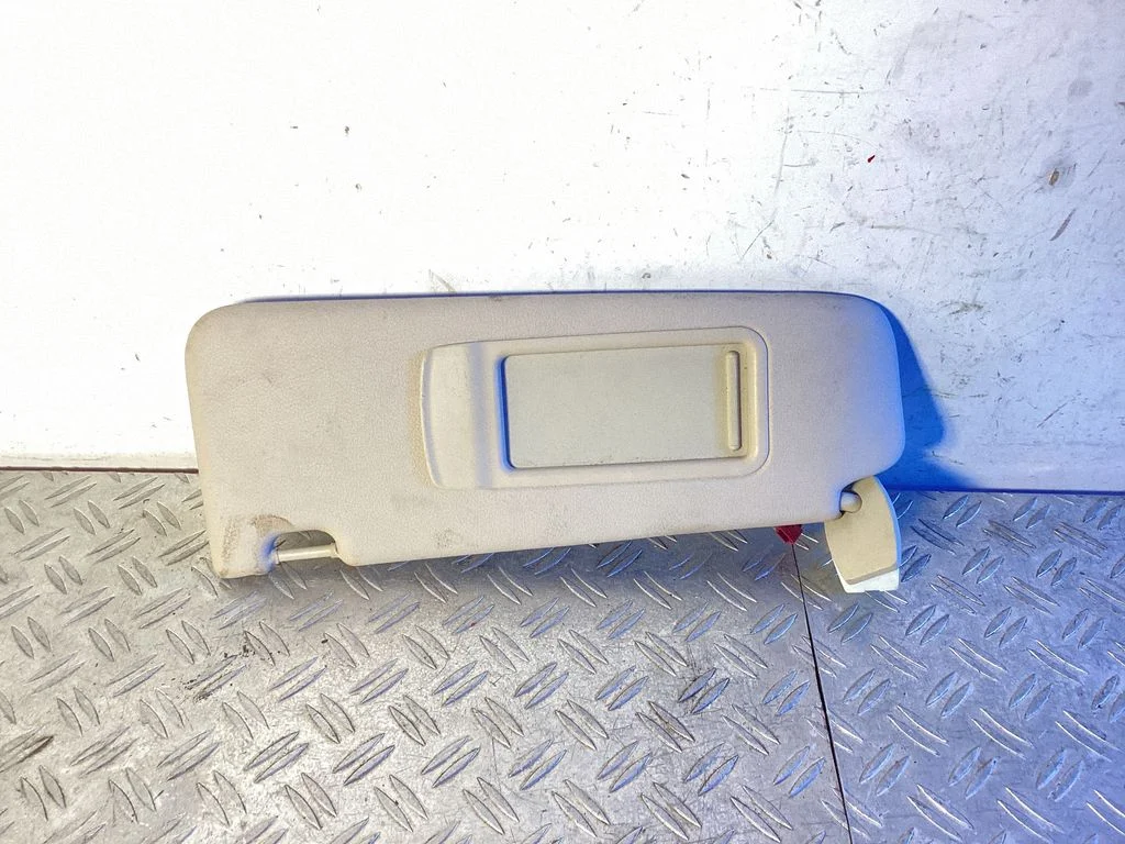 Sun visor – left