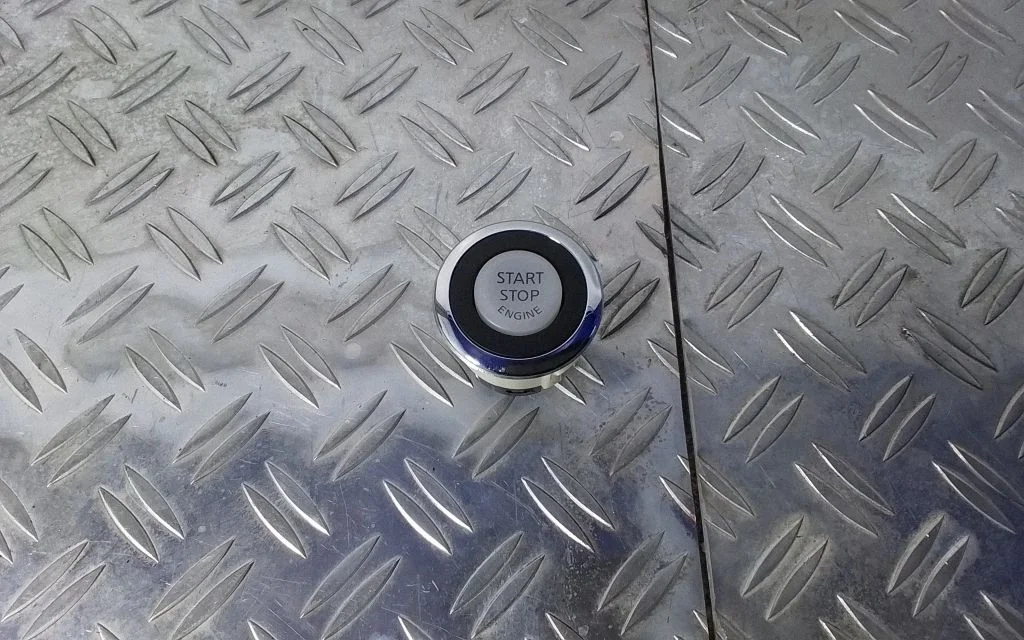Engine start stop button switch