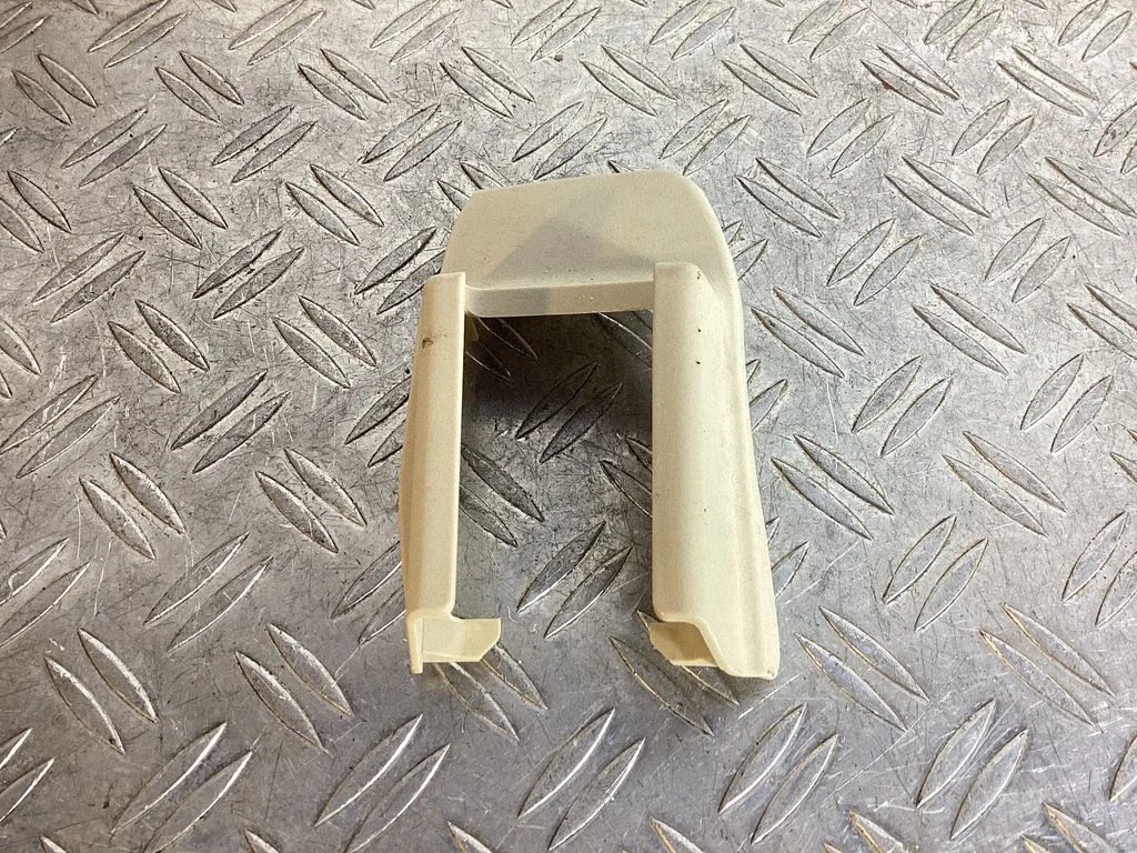 Front driver seat rail trim