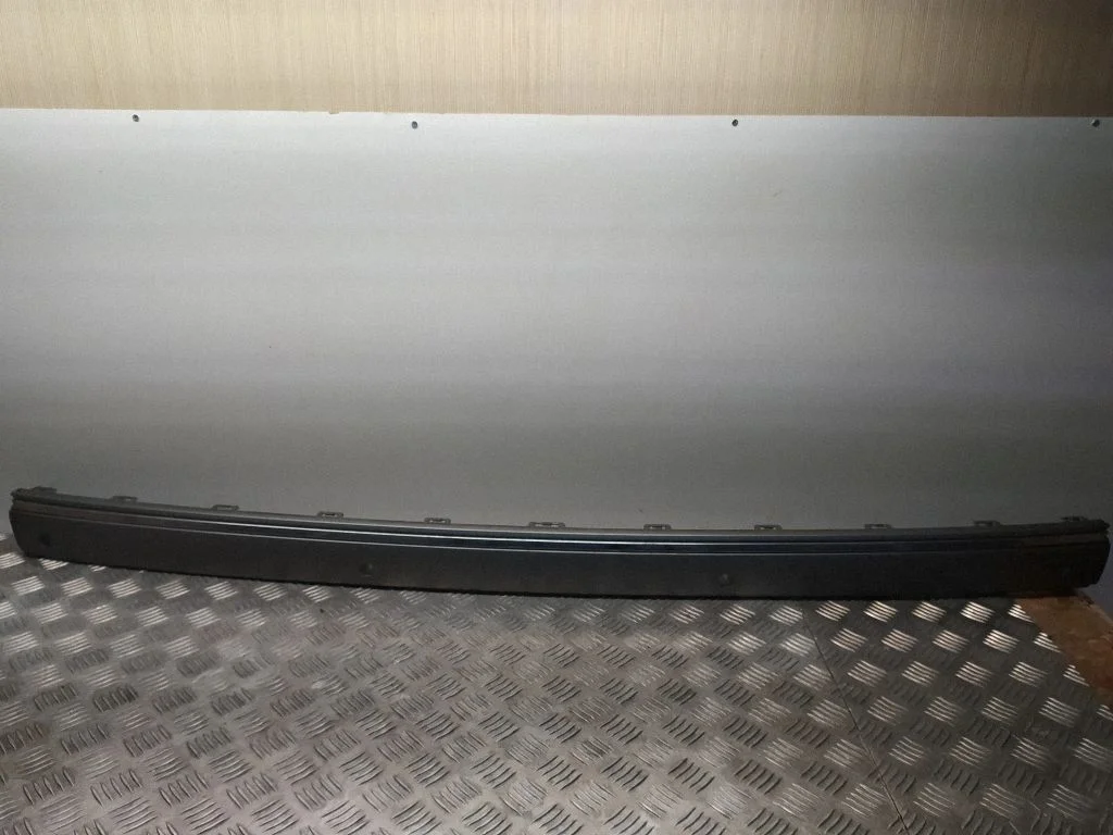 Rear bumper trim bar molding