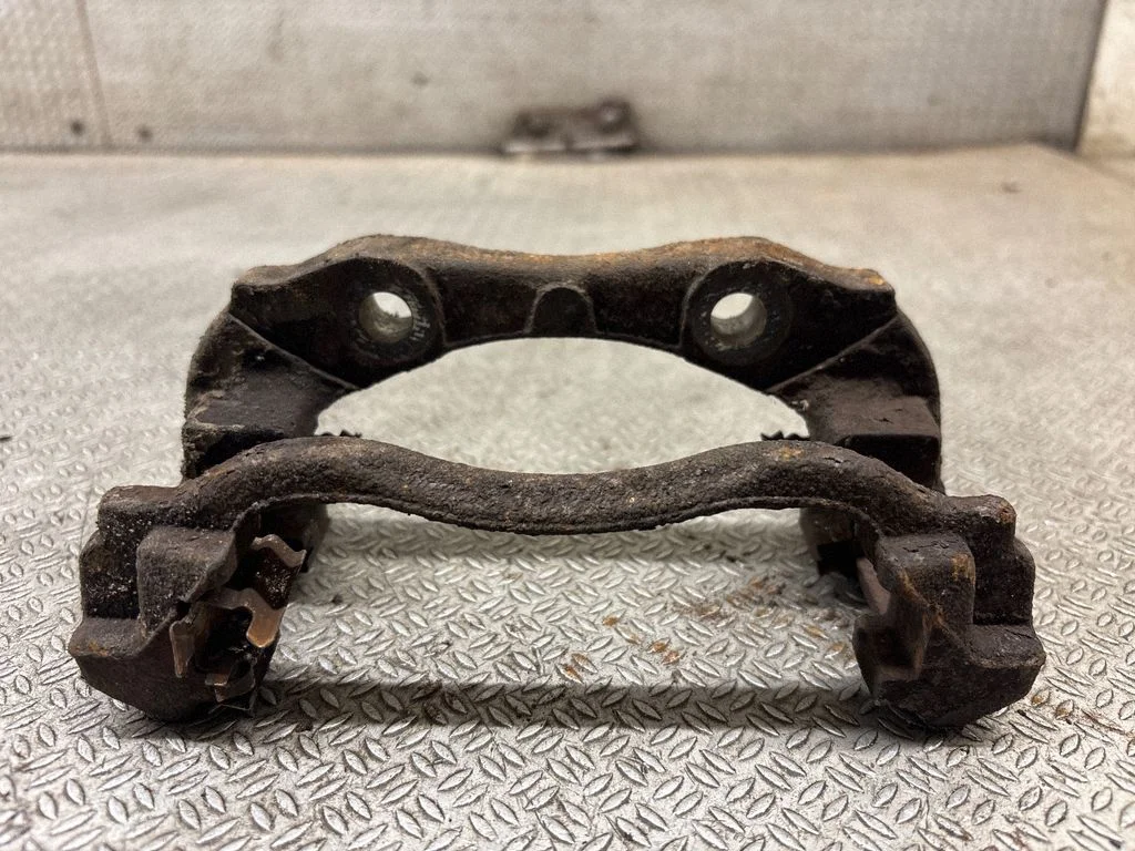 Front Brake Caliper Pad/Carrier