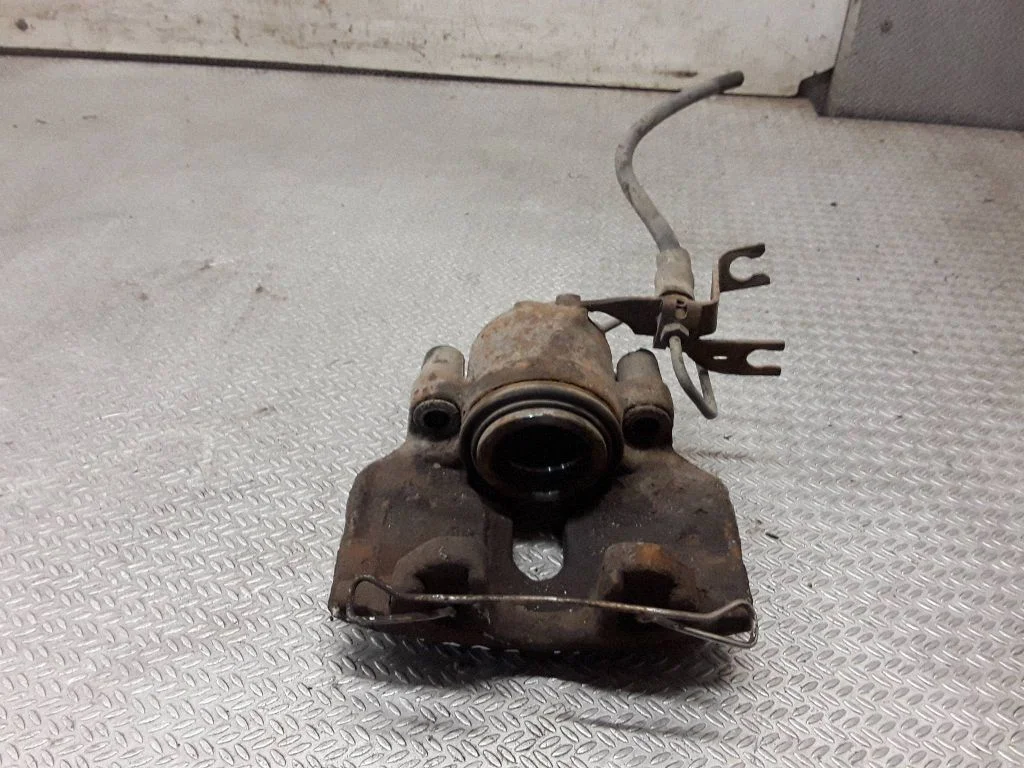 Front brake caliper – left