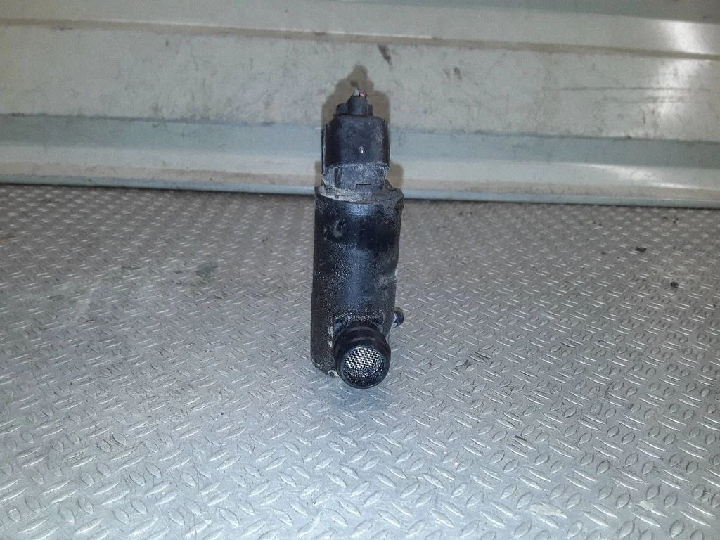 Headlight washer pump