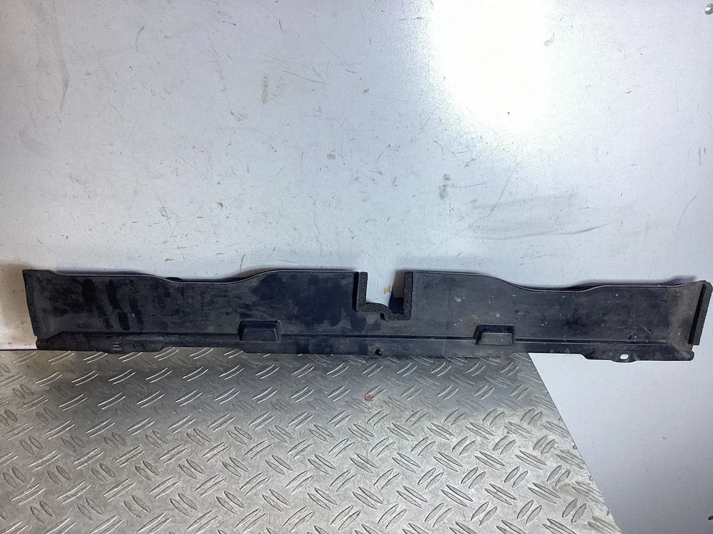 Bottom radiator support slam panel