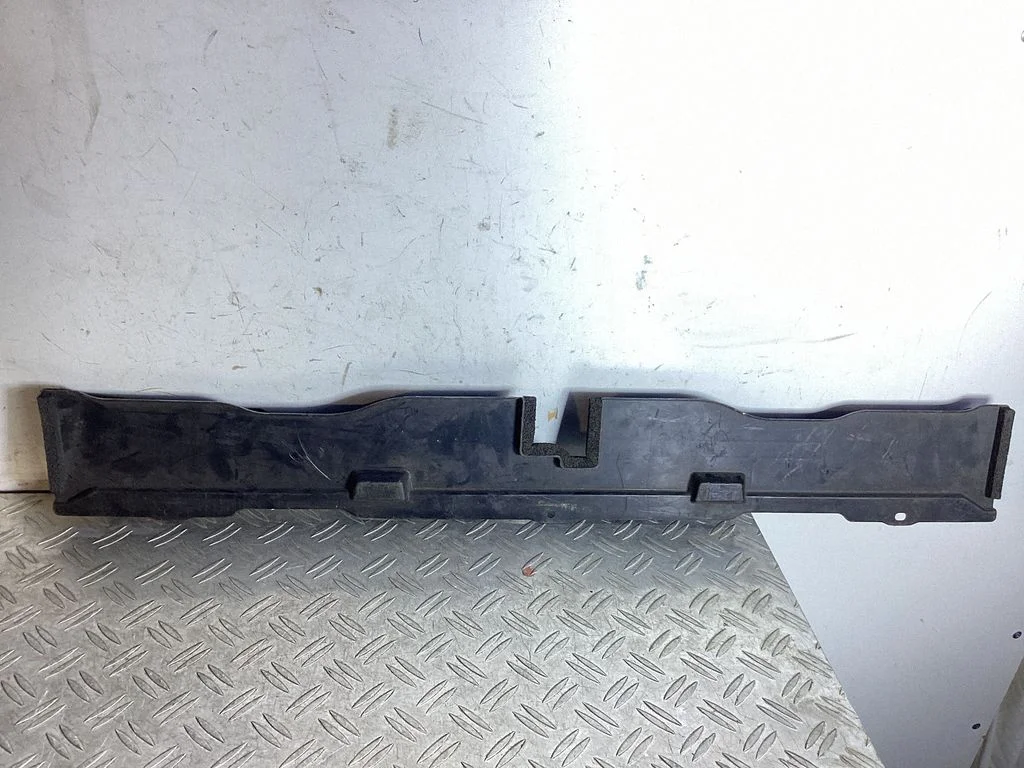 Bottom radiator support slam panel