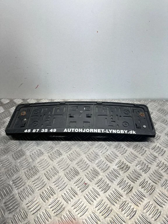 Number plate surrounds holder frame – Mazda 3 I (2003-2006)