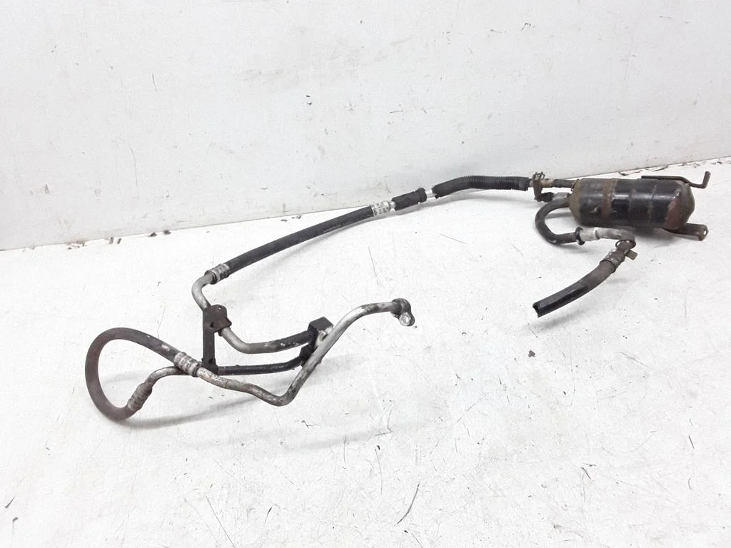 Air conditioning (A/C) air dryer 94BW19D606AB