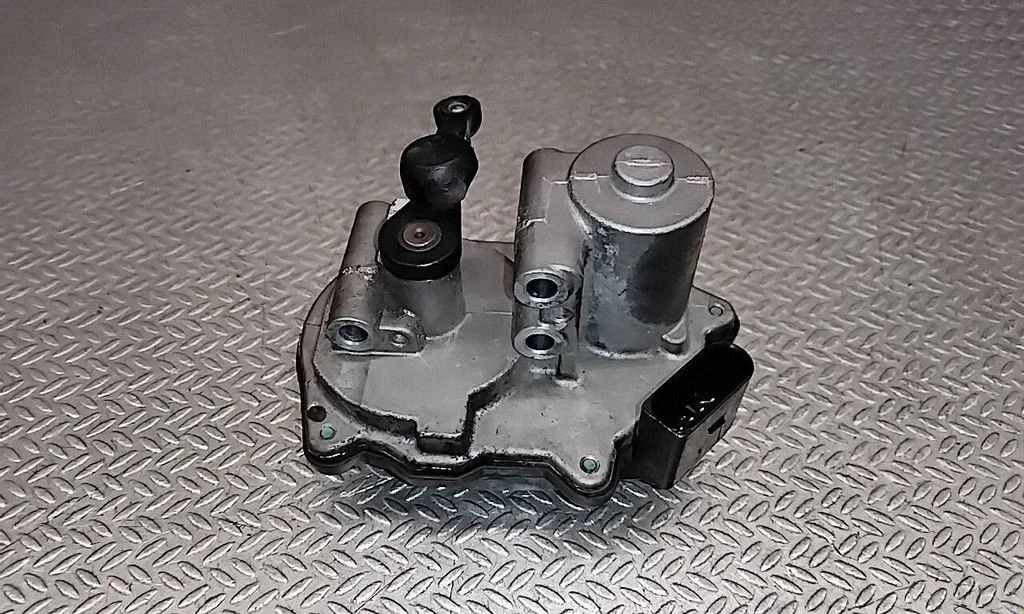 Siłownik klapek kolektora ssącego 03L129086