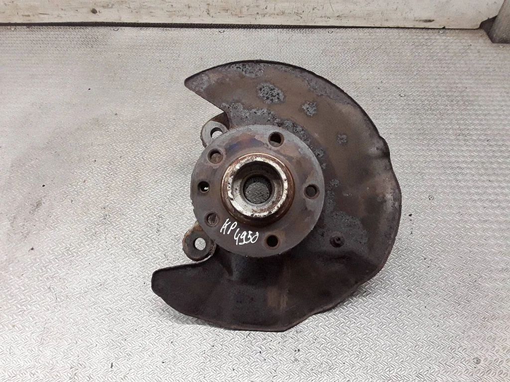 Front wheel hub spindle knuckle – left