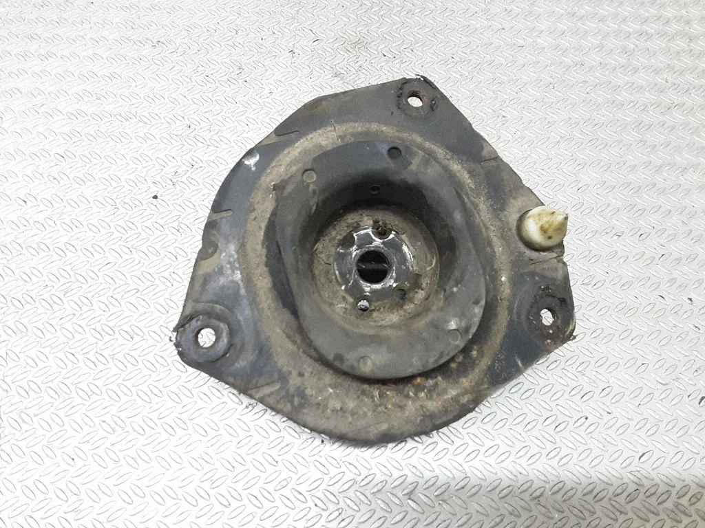 Front coil spring rubber mount